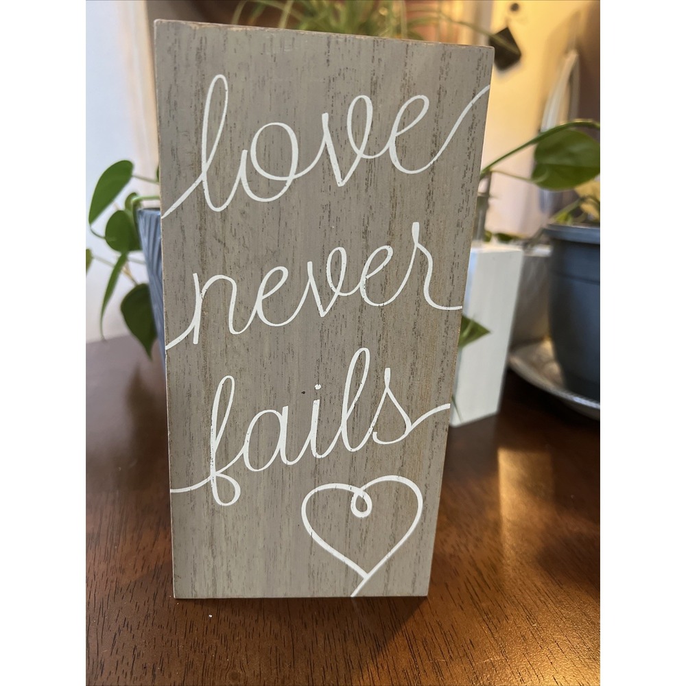 Wood Sign "Love Never Fails"